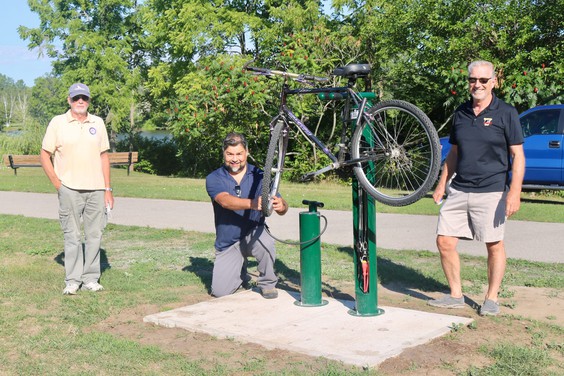 Waterford trail team installing the bike station